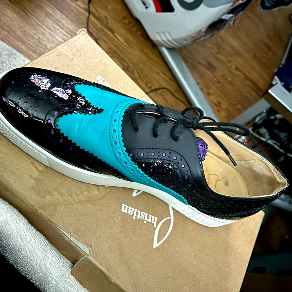 Barely worn mens Christian Louboutin excellent condition comes with box.
